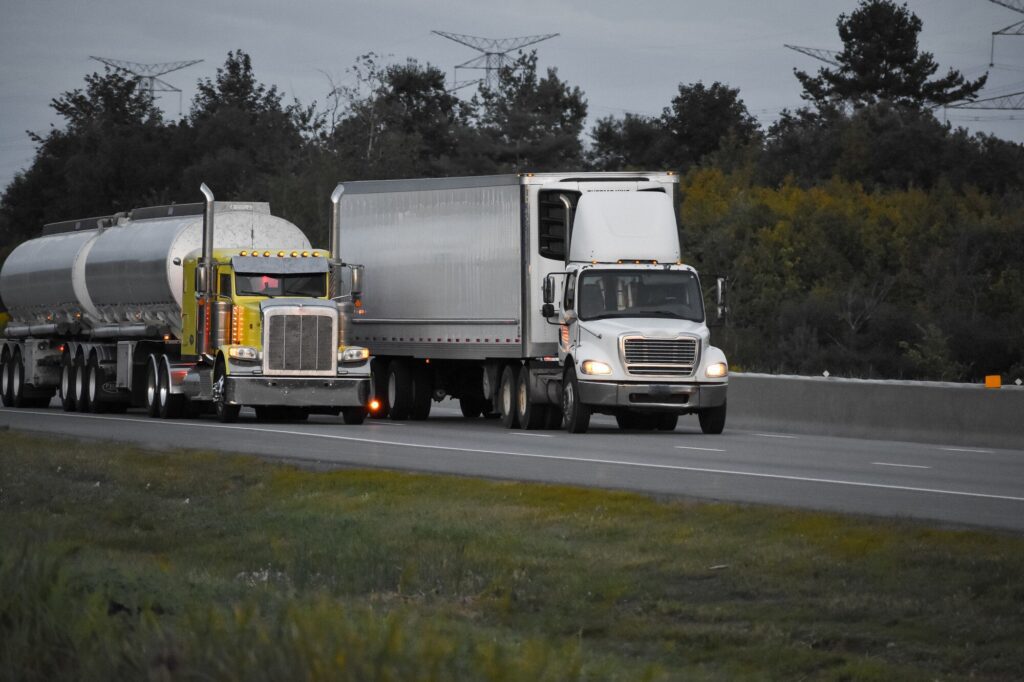 Trailer Trucks Driving Road Surrounded By Beautiful Green Trees 181624 10810 - All Philadelphia Practice Areas - Kaplunmarx Personal Injury Attorneys At Law In Pennsylvania &Amp; New Jersey